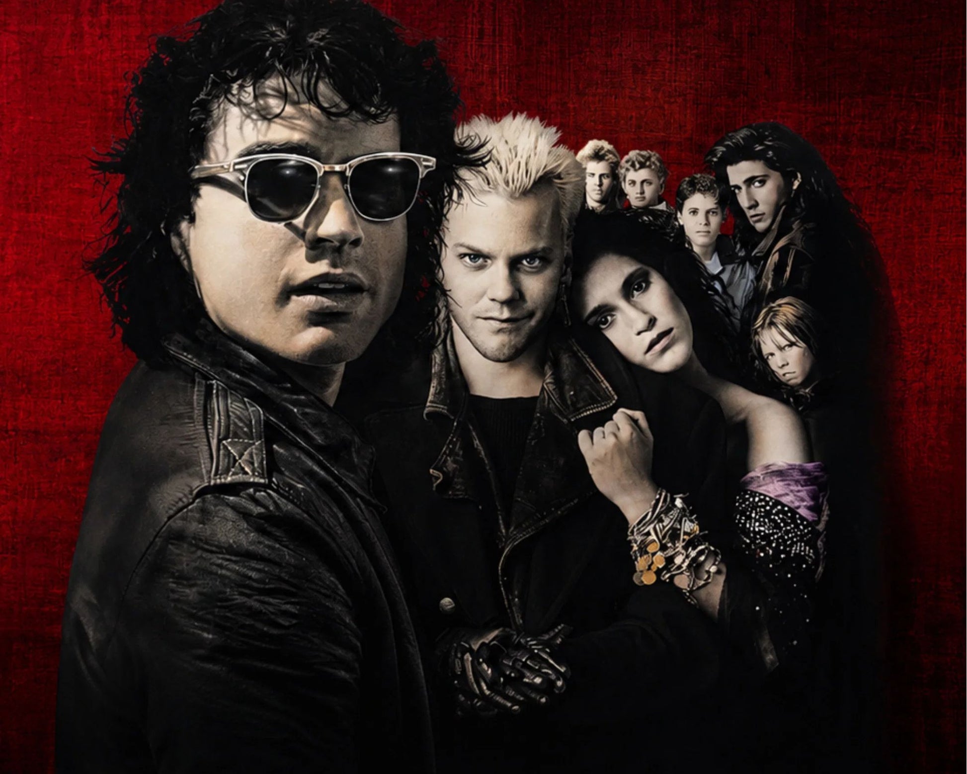 A dramatic promotional poster-style image featuring multiple people against a textured dark red background. The central figure has spiky blond hair and wears a dark jacket, with other cast members visible behind him.