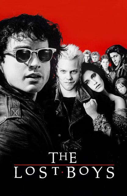 The Lost Boys movie poster featuring the cast in black and white against a bold red background, with the title 'THE LOST BOYS' at the bottom.